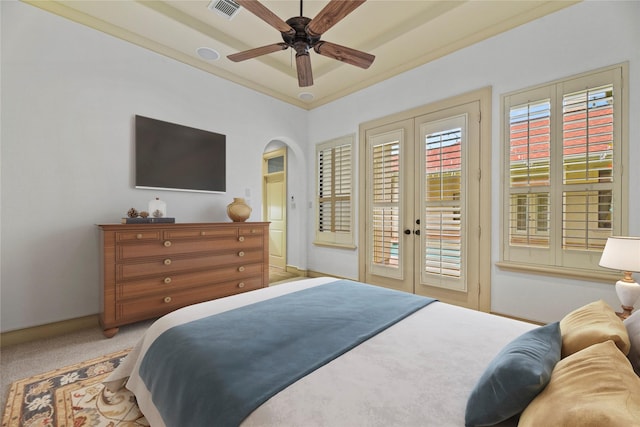 16610 Champagne Falls Ct, Spring, TX 77379 - bedroom with access to outside, french doors, light carpet, baseboards, and arched walkways