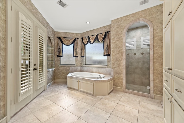 16610 Champagne Falls Ct, Spring, TX 77379 - full bath with a shower stall, a bath, and tile patterned flooring