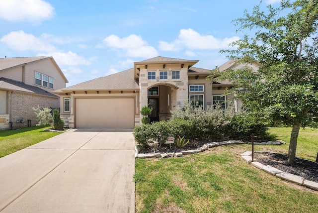 24103 Corinaldo Ct, Katy, TX 77493 - mediterranean / spanish-style home featuring an attached garage, stone siding, concrete driveway, and a front lawn