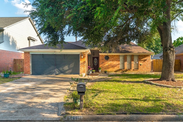 14811 S Bristol Harbour Cir, Houston, TX 77084 - single story home with an attached garage, concrete driveway, and brick siding