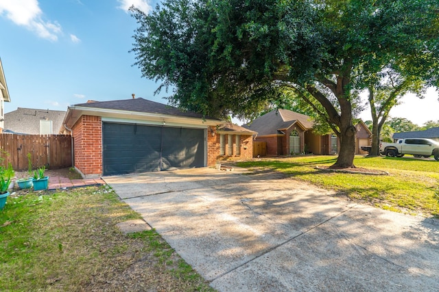 14811 S Bristol Harbour Cir, Houston, TX 77084 - view of front facade featuring concrete driveway, a garage, and brick siding