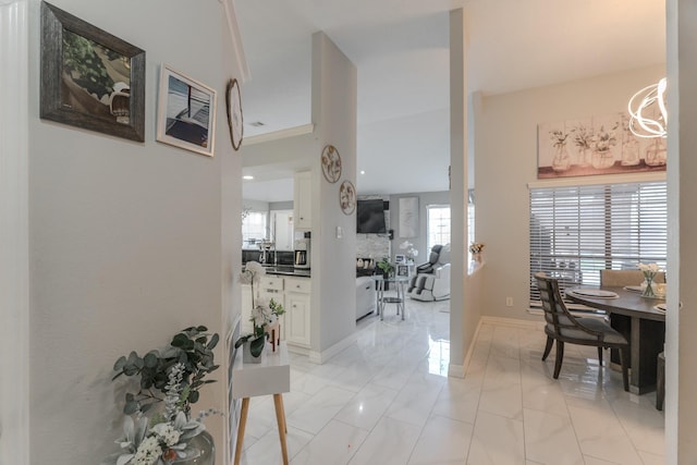 14811 S Bristol Harbour Cir, Houston, TX 77084 - corridor with a chandelier