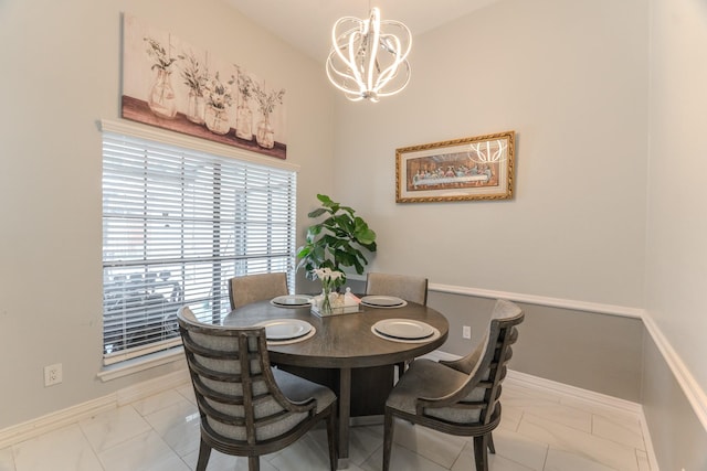 14811 S Bristol Harbour Cir, Houston, TX 77084 - dining area with a chandelier, baseboards, and light marble finish floors
