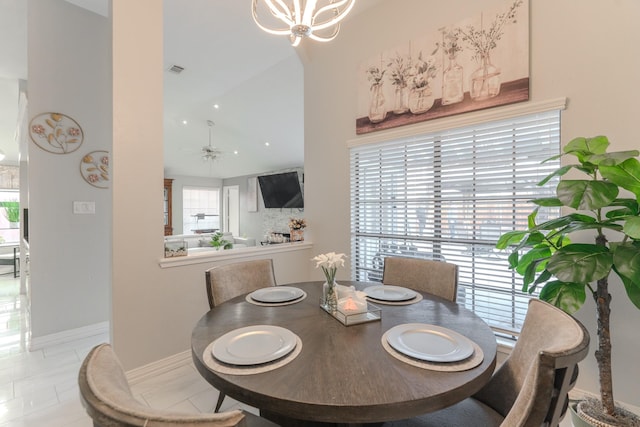 14811 S Bristol Harbour Cir, Houston, TX 77084 - dining area with baseboards, a chandelier, high vaulted ceiling, and ceiling fan