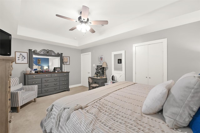 914 W 25th St Unit 2, Houston, TX 77008 - bedroom featuring light colored carpet, a raised ceiling, ceiling fan, and a closet
