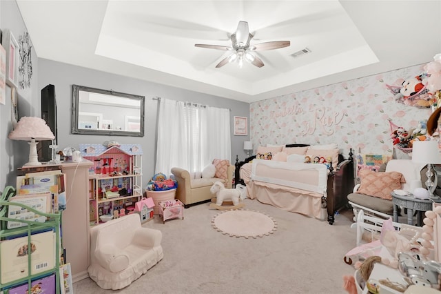 914 W 25th St Unit 2, Houston, TX 77008 - bedroom with a tray ceiling, carpet, and a ceiling fan
