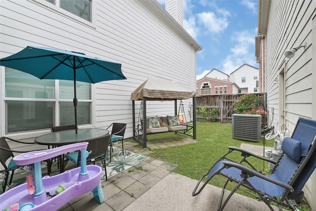 914 W 25th St Unit 2, Houston, TX 77008 - view of patio with central AC and outdoor dining area
