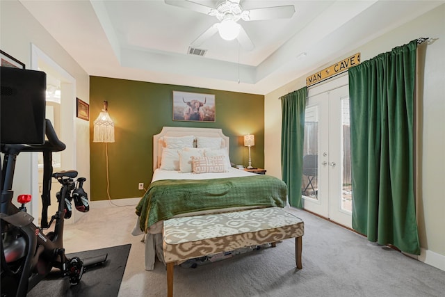 914 W 25th St Unit 2, Houston, TX 77008 - bedroom with carpet flooring, access to outside, french doors, a tray ceiling, and baseboards