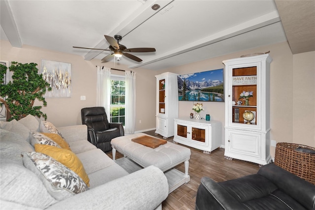 676 Ravensworth Dr, Conroe, TX 77302 - living room featuring beam ceiling, ceiling fan, wood finished floors, and baseboards