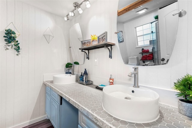 676 Ravensworth Dr, Conroe, TX 77302 - full bath featuring double vanity