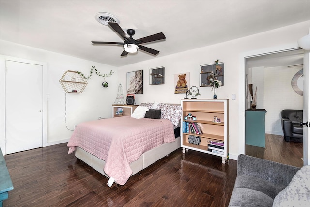 676 Ravensworth Dr, Conroe, TX 77302 - bedroom featuring wood finished floors, baseboards, and a ceiling fan