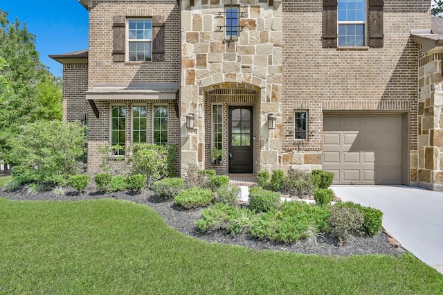 503 Woodsy Pine Ct, Conroe, TX 77304 - view of front of property featuring brick siding, concrete driveway, and a garage