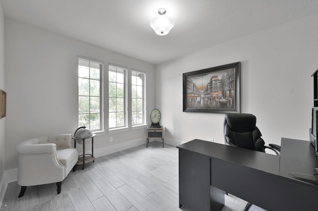 503 Woodsy Pine Ct, Conroe, TX 77304 - home office featuring baseboards