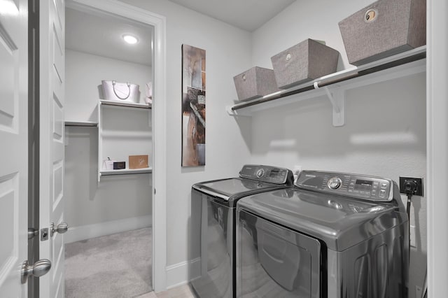 503 Woodsy Pine Ct, Conroe, TX 77304 - laundry area featuring separate washer and dryer and baseboards