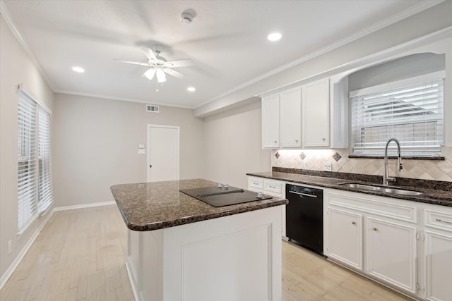 1438 Trace Dr, Houston, TX 77077 - kitchen featuring black appliances, a sink, light wood-style floors, a ceiling fan, and backsplash