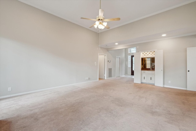 1438 Trace Dr, Houston, TX 77077 - spare room with baseboards, a ceiling fan, light carpet, ornamental molding, and recessed lighting
