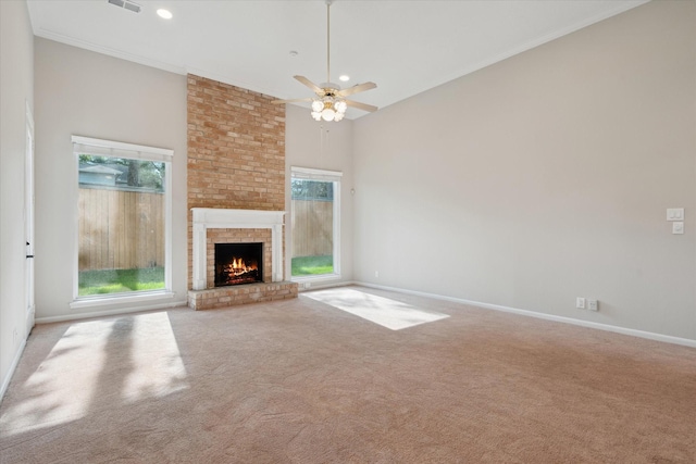 1438 Trace Dr, Houston, TX 77077 - unfurnished living room with carpet flooring, baseboards, a brick fireplace, recessed lighting, and crown molding