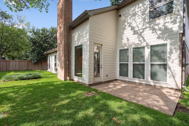 1438 Trace Dr, Houston, TX 77077 - back of property with a chimney and a patio