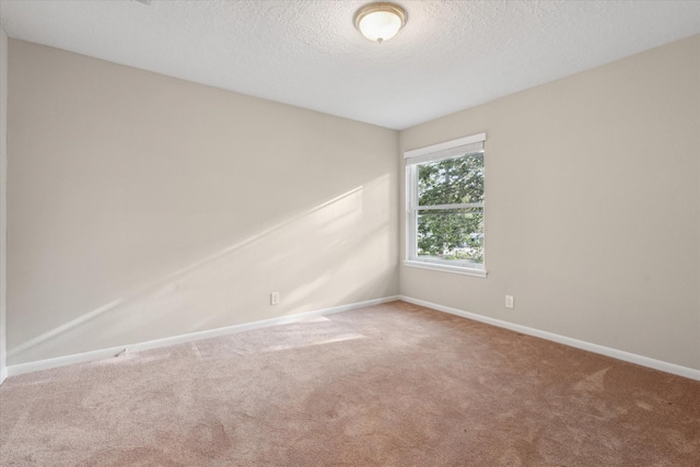 1438 Trace Dr, Houston, TX 77077 - carpeted spare room with baseboards and a textured ceiling