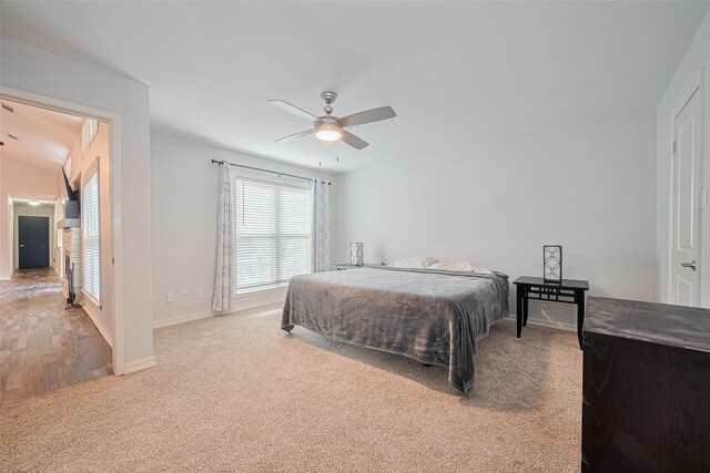 2023 Wilcrest Dr, Houston, TX 77042 - carpeted bedroom featuring baseboards and a ceiling fan