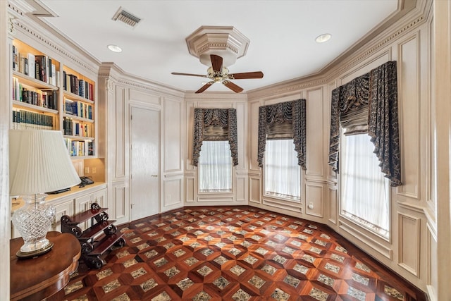 903 Old Lake Rd, Houston, TX 77057 - unfurnished room featuring a ceiling fan, a decorative wall, ornamental molding, and recessed lighting