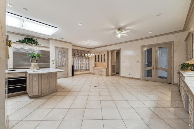 903 Old Lake Rd, Houston, TX 77057 - kitchen featuring crown molding, light countertops, ceiling fan, light tile patterned flooring, and stainless steel built in refrigerator