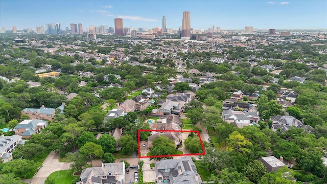 903 Old Lake Rd, Houston, TX 77057 - aerial view of property and surrounding area with property boundaries highlighted and city skyline