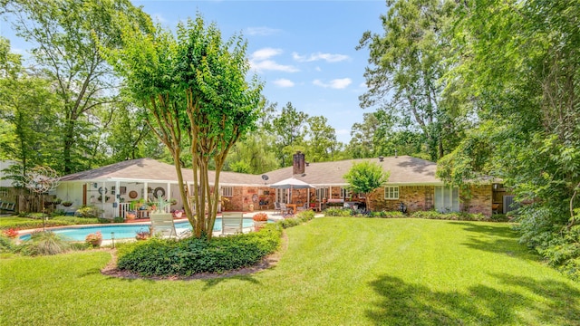 16814 Creeksouth Rd, Houston, TX 77068 - view of grassy yard featuring an outdoor pool