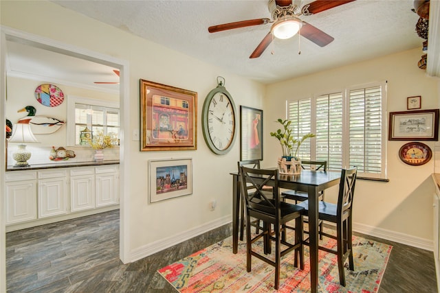 16814 Creeksouth Rd, Houston, TX 77068 - dining room featuring ceiling fan, dark wood-style floors, baseboards, and a textured ceiling