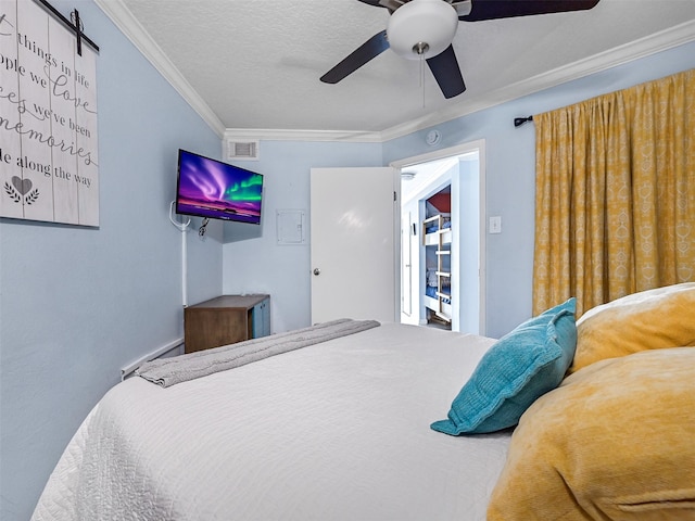 6300 Seawall Blvd Unit 3123, Galveston, TX 77551 - bedroom with crown molding, a baseboard heating unit, and a ceiling fan