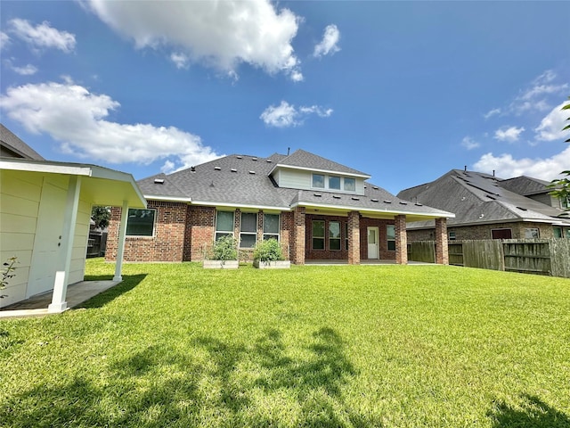 9314 Wheatfield Ln, Rosenberg, TX 77469 - back of property with brick siding