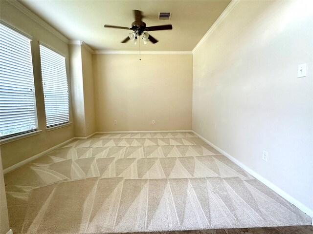 9314 Wheatfield Ln, Rosenberg, TX 77469 - spare room with light colored carpet, ceiling fan, ornamental molding, and baseboards