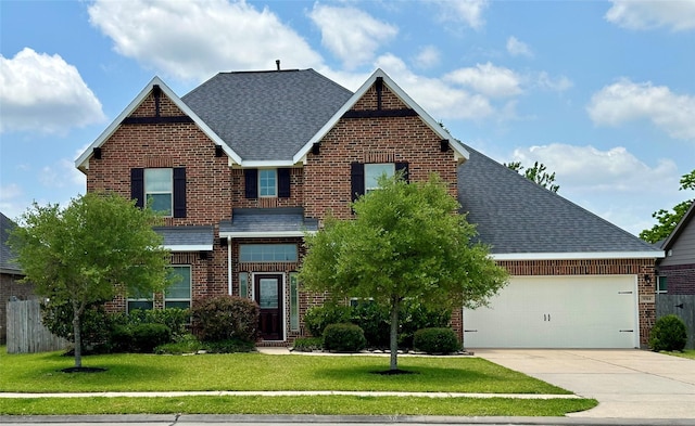 9314 Wheatfield Ln, Rosenberg, TX 77469 - traditional home featuring brick siding, roof with shingles, a garage, and driveway