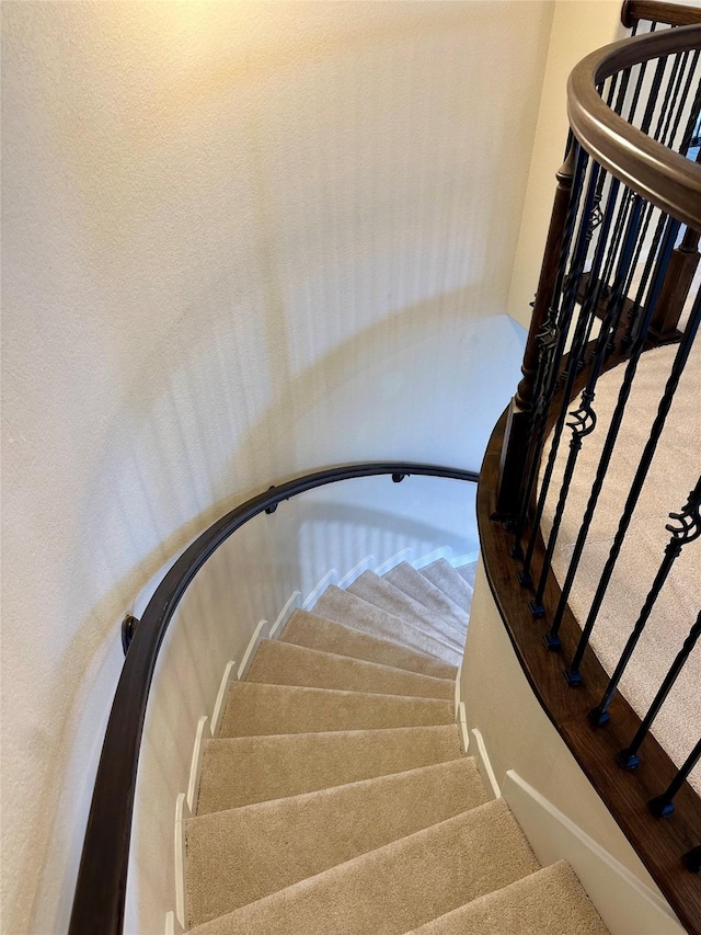 9314 Wheatfield Ln, Rosenberg, TX 77469 - stairs with carpet floors