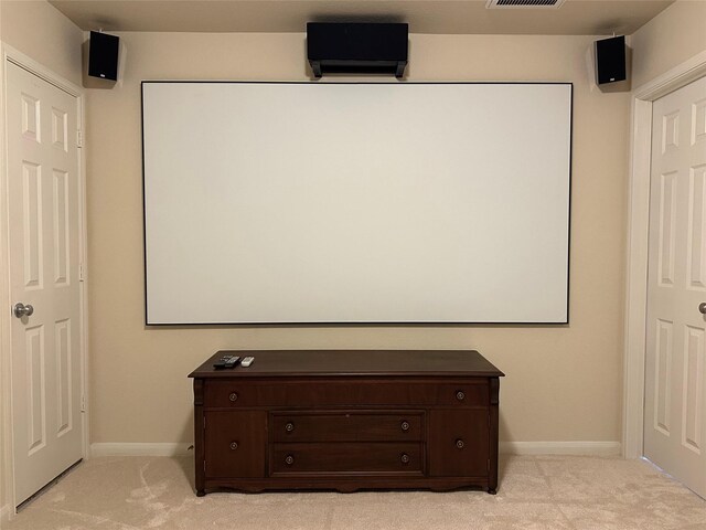 9314 Wheatfield Ln, Rosenberg, TX 77469 - home theater featuring light carpet and baseboards
