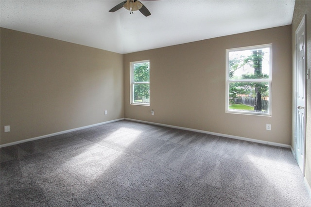 16726 Warbler Dr, Conroe, TX 77385 - carpeted spare room with a ceiling fan and baseboards
