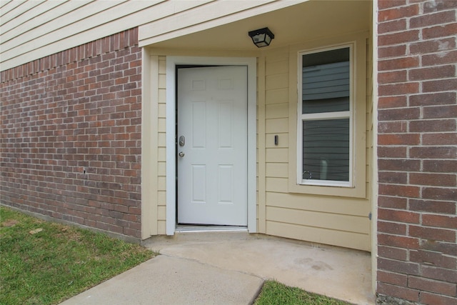 16726 Warbler Dr, Conroe, TX 77385 - property entrance featuring brick siding