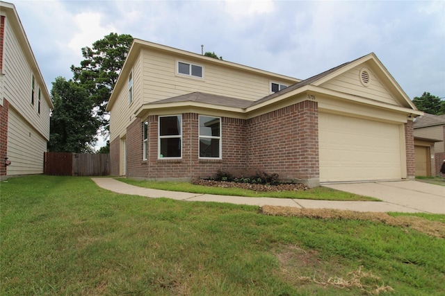 16726 Warbler Dr, Conroe, TX 77385 - traditional-style house with brick siding, an attached garage, and driveway