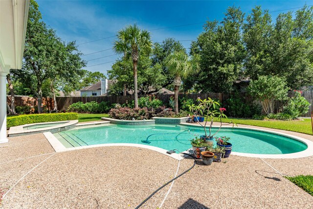 5706 Amber Queen Ct, Houston, TX 77041 - view of pool with a fenced backyard, a patio, and a pool with connected hot tub