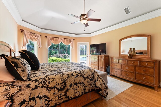 5706 Amber Queen Ct, Houston, TX 77041 - bedroom featuring wood finished floors, access to exterior, crown molding, and ceiling fan