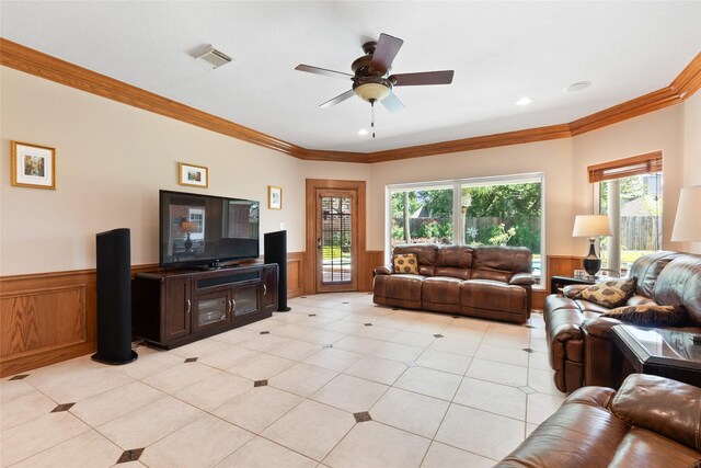 5706 Amber Queen Ct, Houston, TX 77041 - living area featuring wainscoting, crown molding, a ceiling fan, light tile patterned floors, and recessed lighting