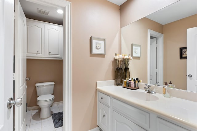 5706 Amber Queen Ct, Houston, TX 77041 - bathroom featuring vanity, toilet, tile patterned flooring, and baseboards