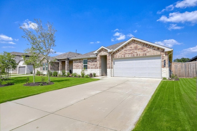 40518 Crisp Beech St, Magnolia, TX 77354 - ranch-style home with driveway, a garage, stone siding, and brick siding