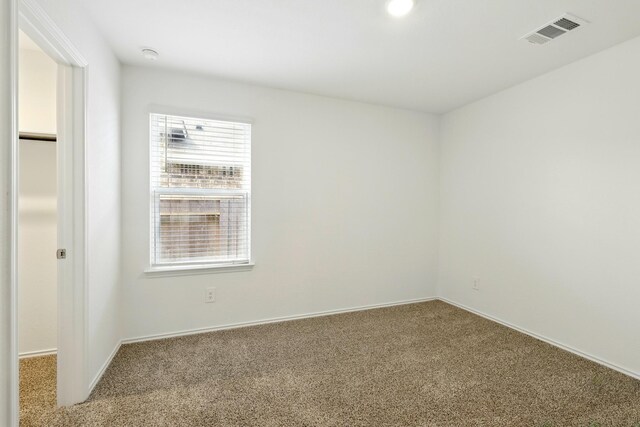 40518 Crisp Beech St, Magnolia, TX 77354 - carpeted spare room with baseboards and a smoke detector