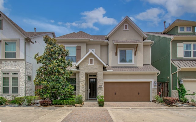 5726 Brancott Way, Houston, TX 77096 - multi unit property with stucco siding, stone siding, an attached garage, and decorative driveway