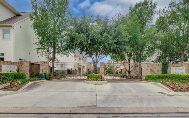 5726 Brancott Way, Houston, TX 77096 - view of concrete road featuring a gate, a gated entry, and curbs