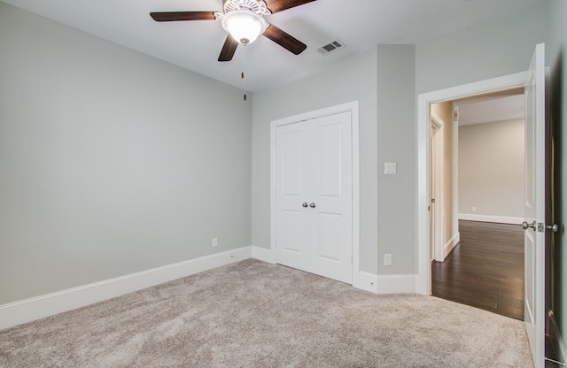 5726 Brancott Way, Houston, TX 77096 - unfurnished bedroom featuring carpet flooring, baseboards, a closet, and a ceiling fan