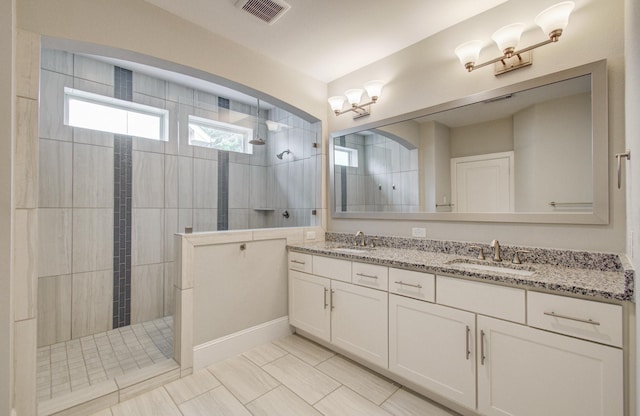5726 Brancott Way, Houston, TX 77096 - full bathroom featuring double vanity, a walk in shower, and tile patterned flooring