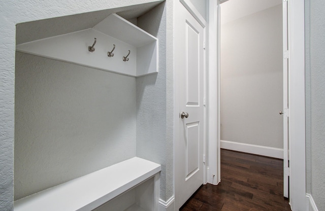 5726 Brancott Way, Houston, TX 77096 - mudroom with dark wood-style flooring and a textured wall