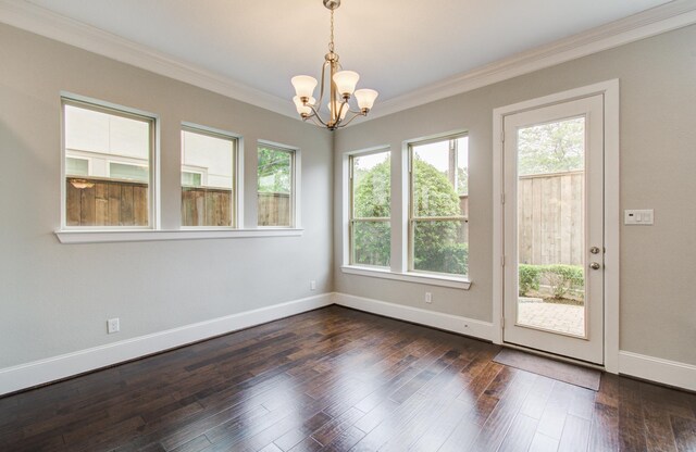 5726 Brancott Way, Houston, TX 77096 - unfurnished room featuring a chandelier, ornamental molding, baseboards, and dark wood finished floors